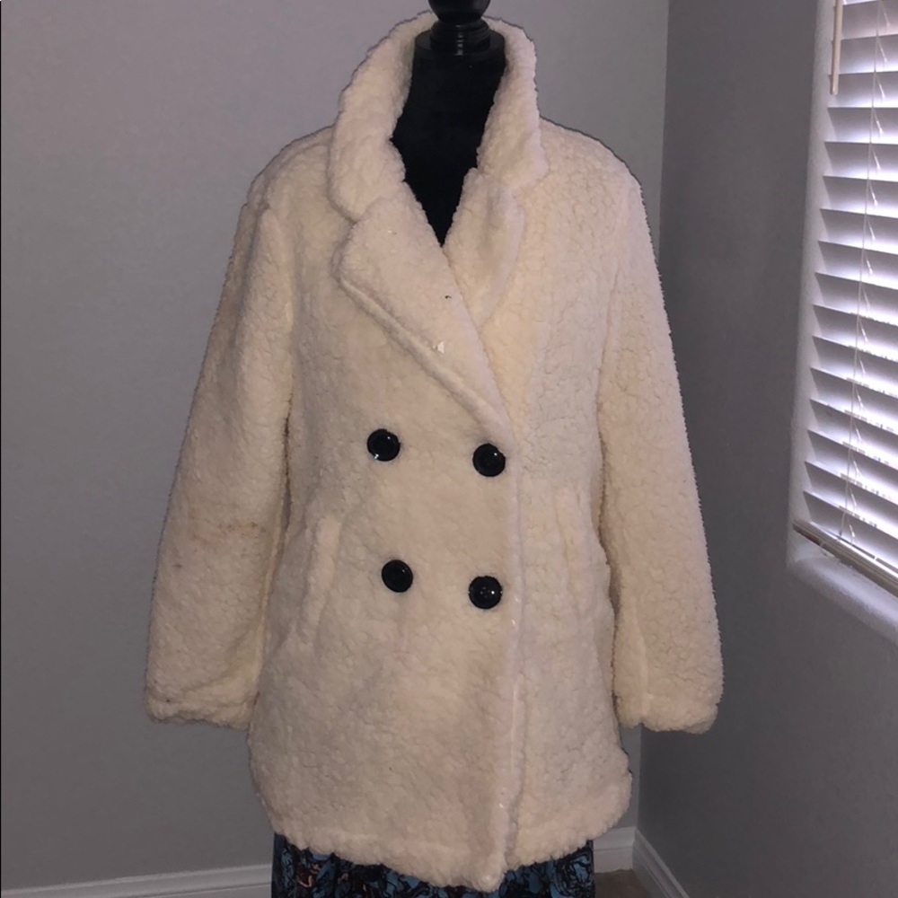 Haute Monde- lined double breast lined shearling.